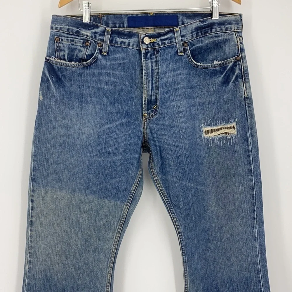 Levi’s 527 Mens Size 36 Patch Distressed straight jeans